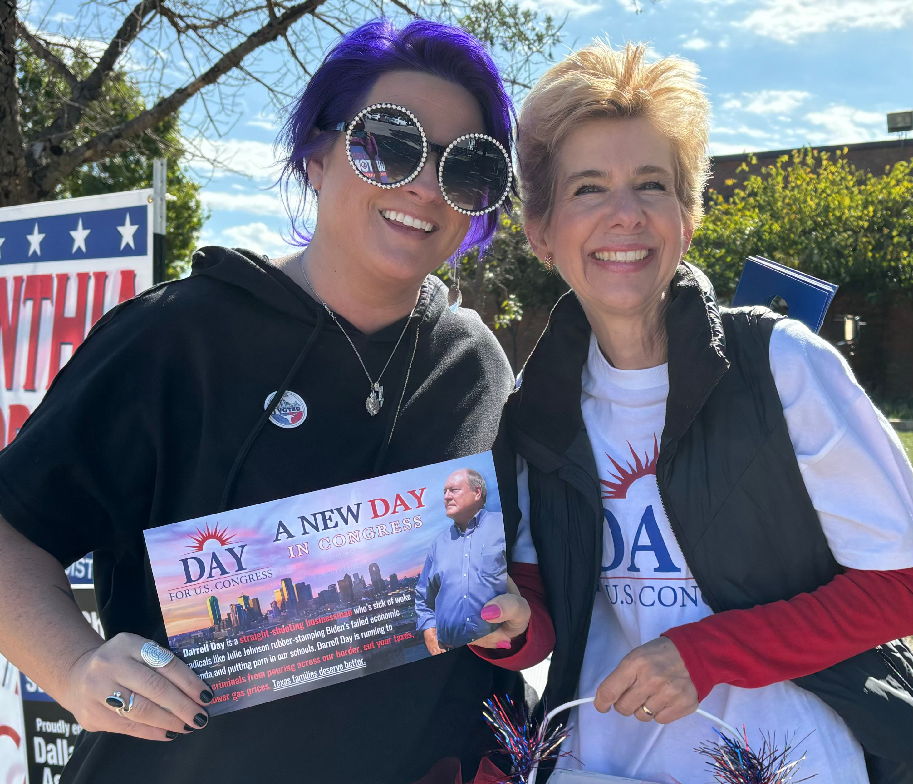 Supporters holding Darrell Day for U.S. Congress campaign literature during a community block-walking event in Texas District 32
